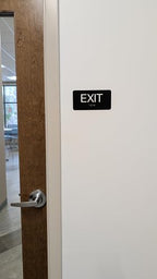 NAP TAGS Exit Sign ADA Compliant with Braille – Black Tactile Exit Sign 6" x 9", Indoor, Easy Installation, Made in the USA