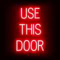 SpellBrite USE THIS DOOR Sign | Directional Sign with Neon Look, Red LED Light Source | 17.4" x 23.8"