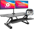 Mount-It! Electric Standing Desk Converter with Dual Monitor Arm, Stand Up Desk Riser X-Large 47.2" Wide, Electric Desk Riser with Mount for 2 Screens (Max 32"), Desktop with Keyboard Tray, USB, Black