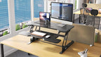 Mount-It! 38" Standing Desk Converter, Desktop Sit-Stand Desk Riser with Gas Spring Height Adjustment, Compact Desk Topper for Dual Monitors or Laptop, Keyboard Tray, Black
